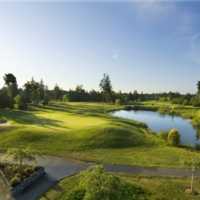Aerial view of green with water coming into play at Crown Isle Golf Course